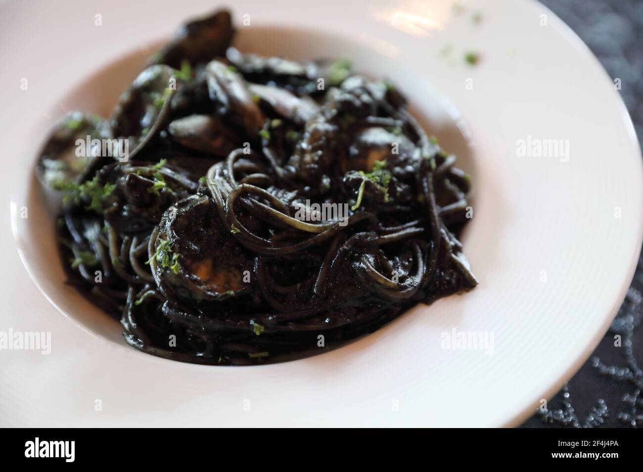 Spaghetti seafood with squid ink , Italian food Stock Photo