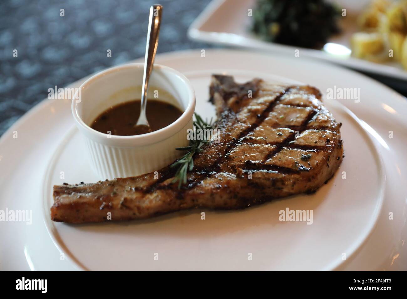 Pork chop steak with Garlic Roasted Potatoes Stock Photo Alamy