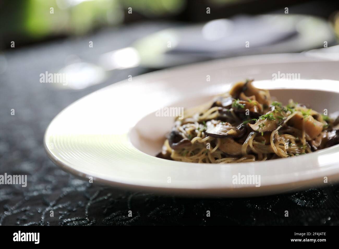 Spaghetti truffle cream sauce with mushroom Stock Photo Alamy