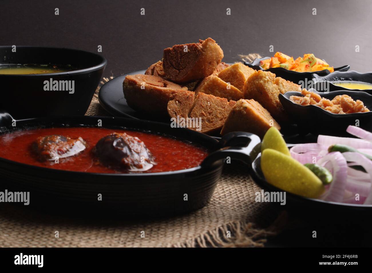 bafle or bati is popular main course dish in India served with dal daal