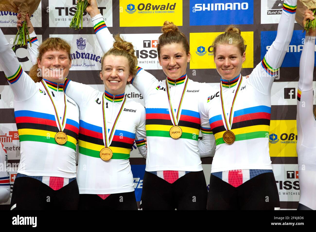 Team USA celebrates winning the women’s team pursuit at the UCI Track World Championships, Berlin, Germany (L-R) Lily Williams, Emma White, Chloe Dyge Stock Photo