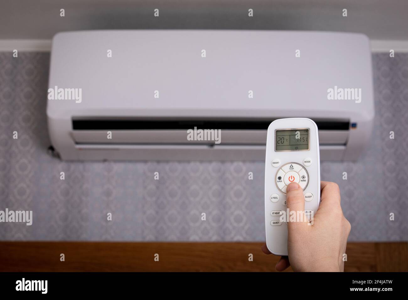 Woman Hand Operating Air Conditioner With Remote Control. Comfort And ...