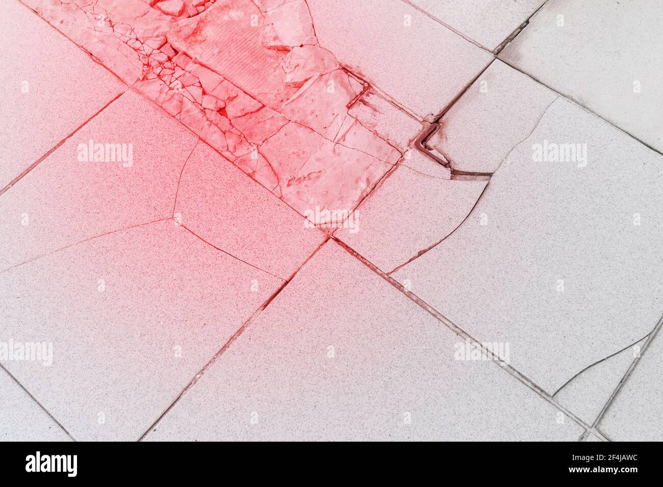 Old broken tile cracked floor repair background, renovation concept. Stock Photo