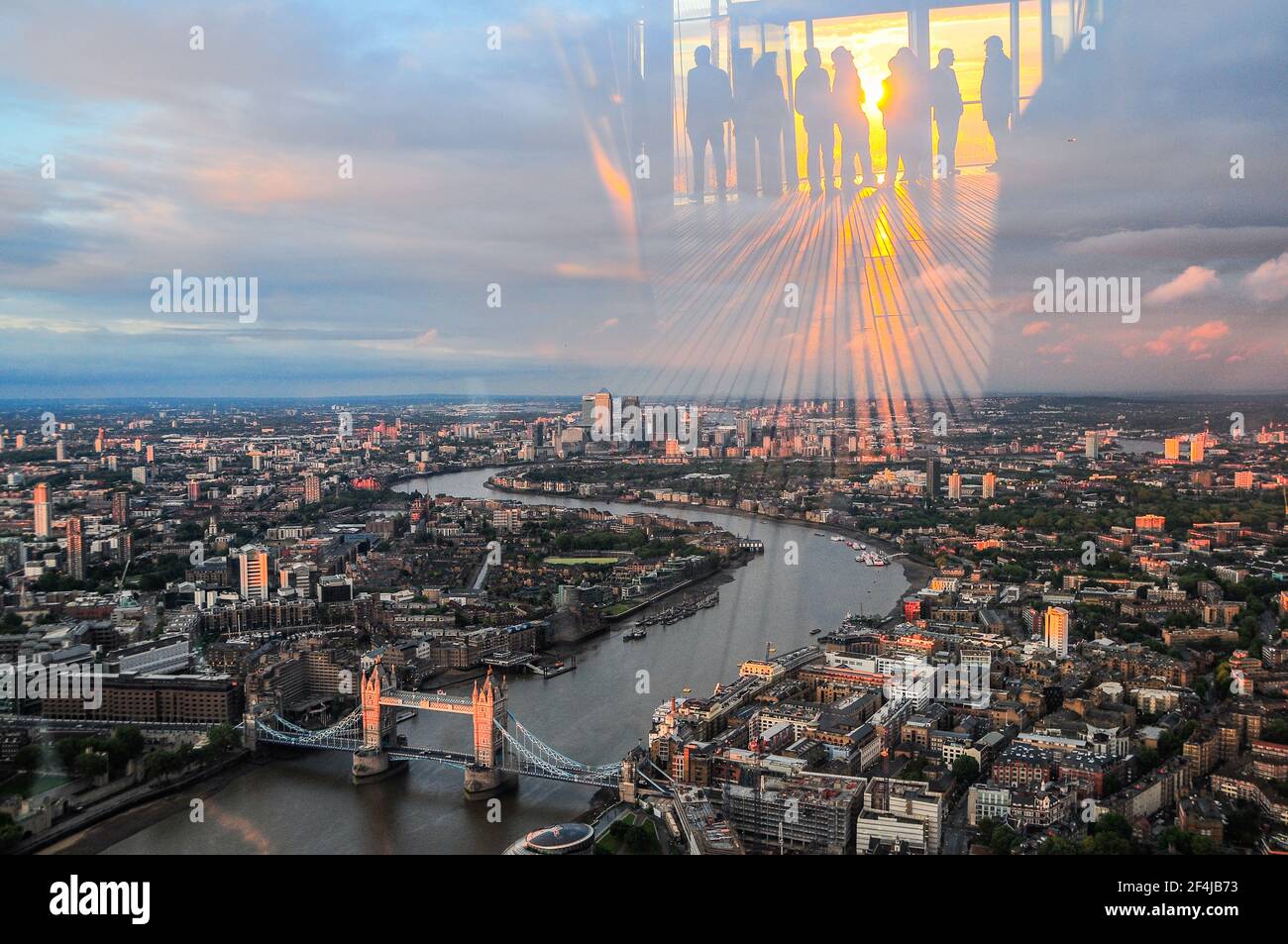 View east along the Thames and reflection in window at the Shard, London Stock Photo