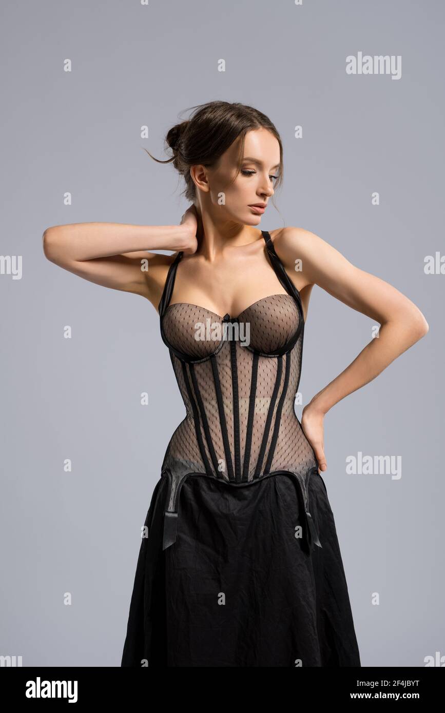 Elegant slim woman in skirt and corset Stock Photo