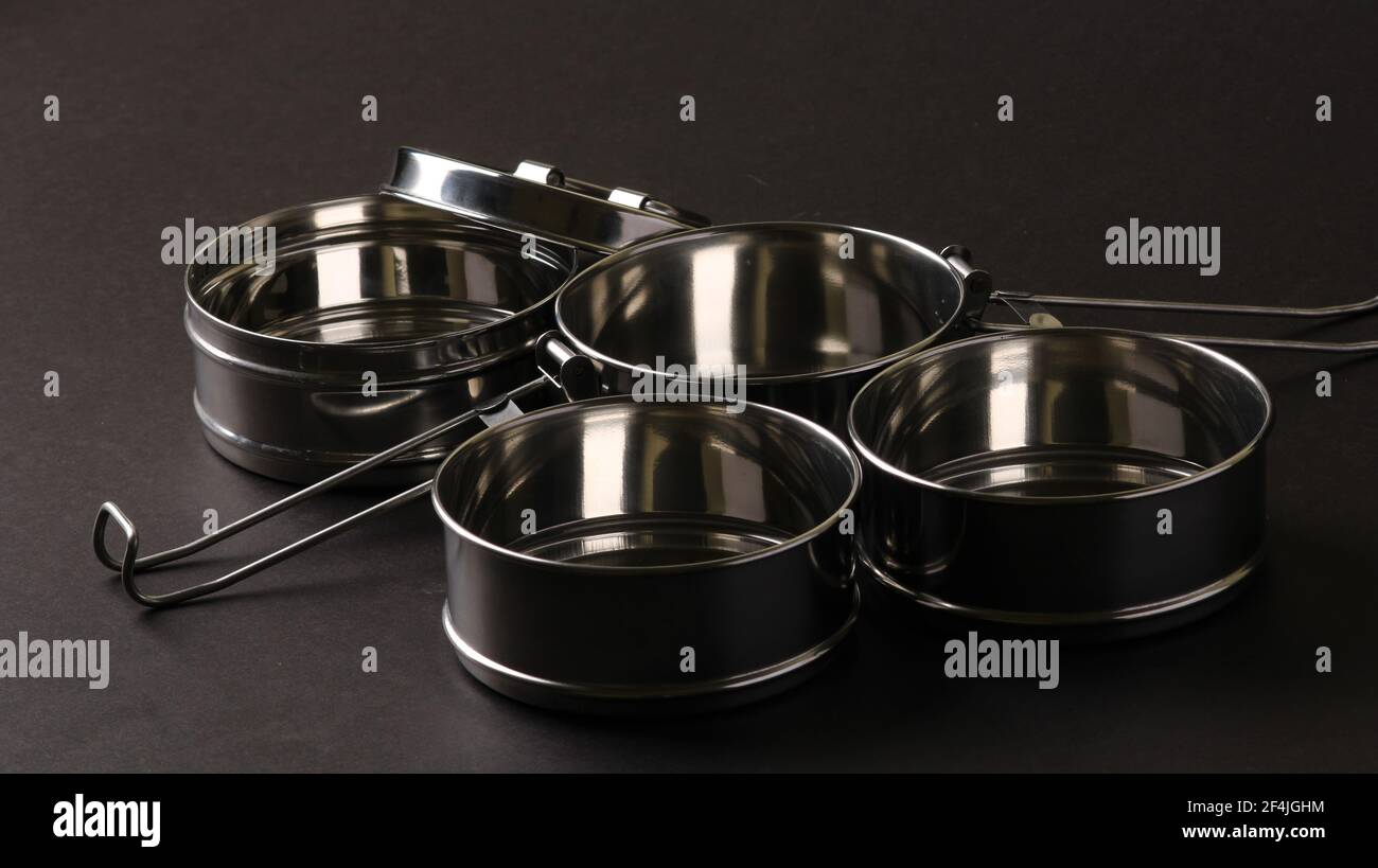 https://c8.alamy.com/comp/2F4JGHM/typical-indian-stainless-steel-tiffin-box-2F4JGHM.jpg