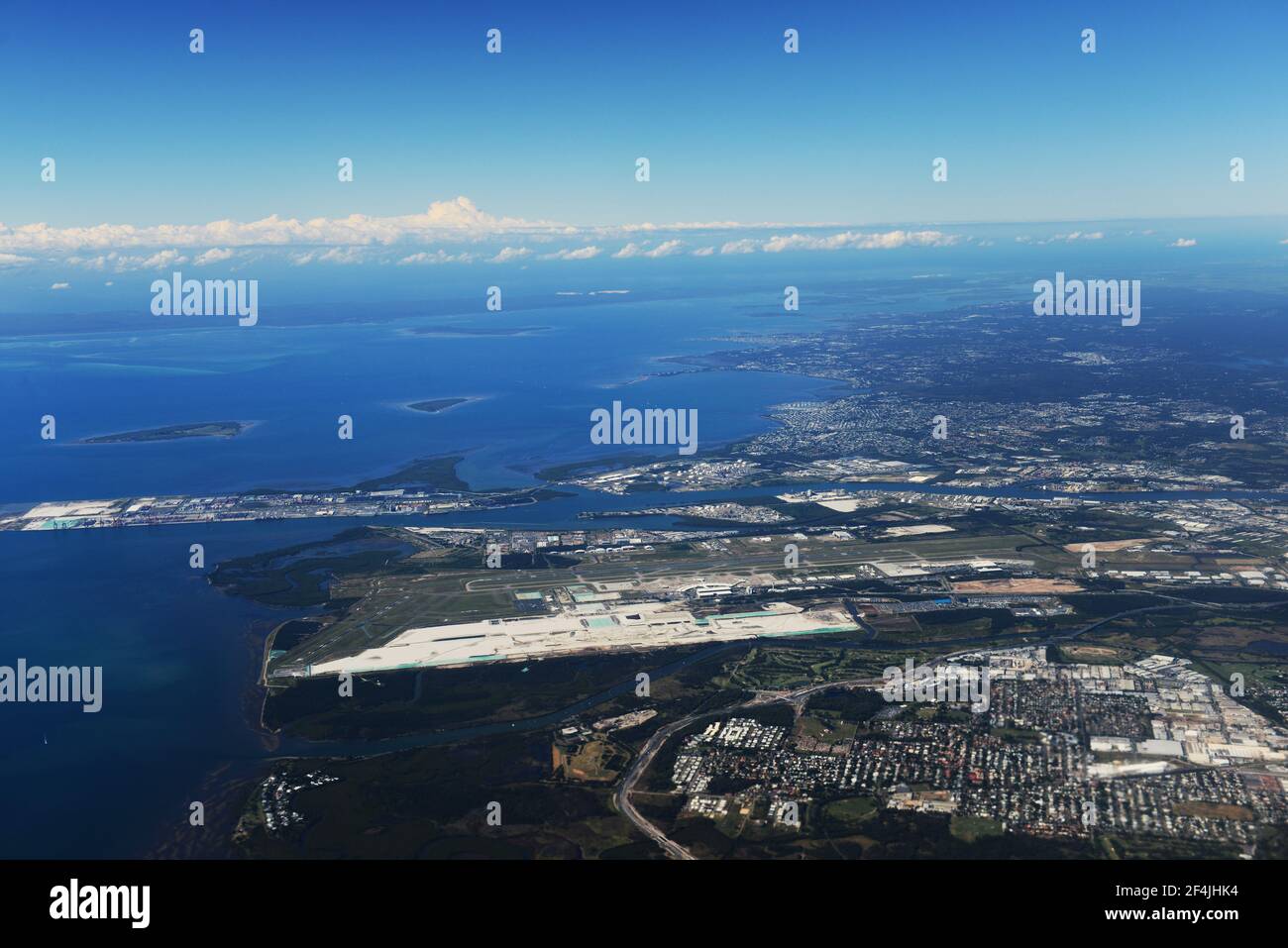 Aerial view of Brisbane international airport and the coastline next to it. Stock Photo