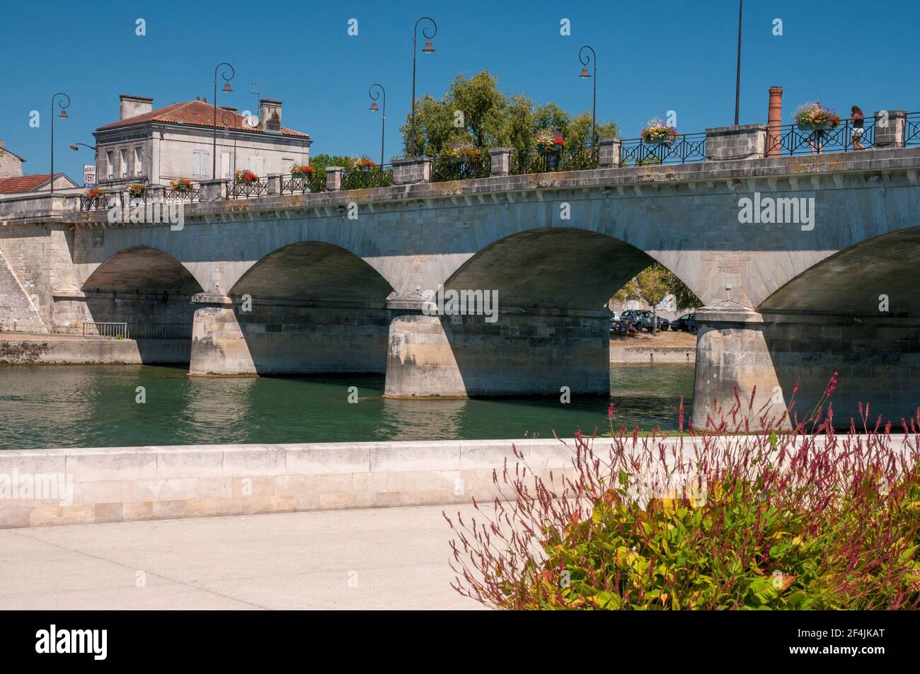 Bridge over the Charente river in Cognac, Charente (16), Nouvelle-Aquitaine region, France Stock Photo