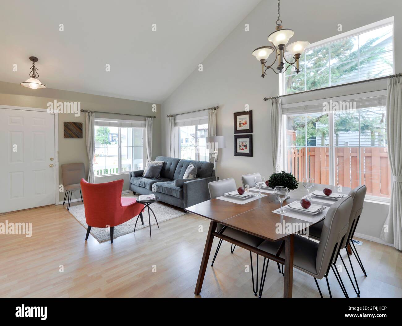 Modern residential dining room and living room interior Stock Photo - Alamy