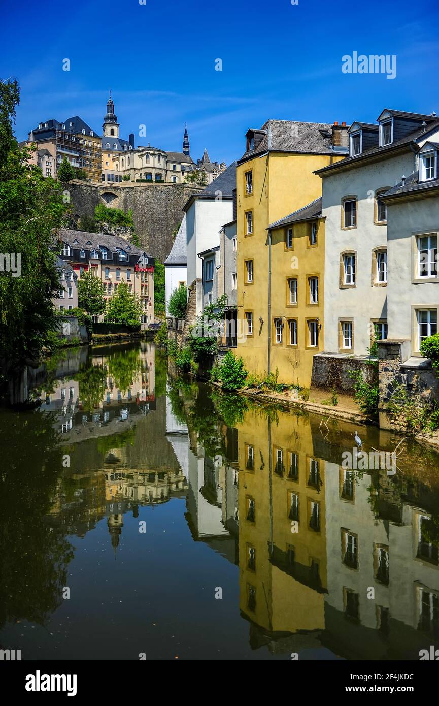 Luxembourg city, Luxembourg - July 16, 2019: Cozy riverside houses in Luxembourg city on a sunny summer day Stock Photo