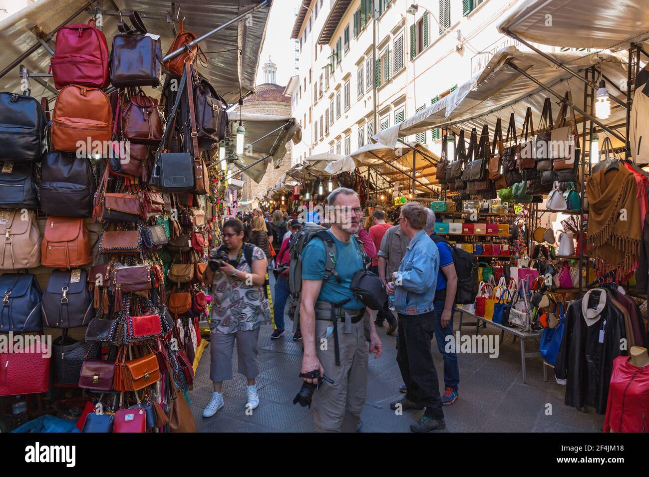 Street market with tourists in Florence Stock Photo