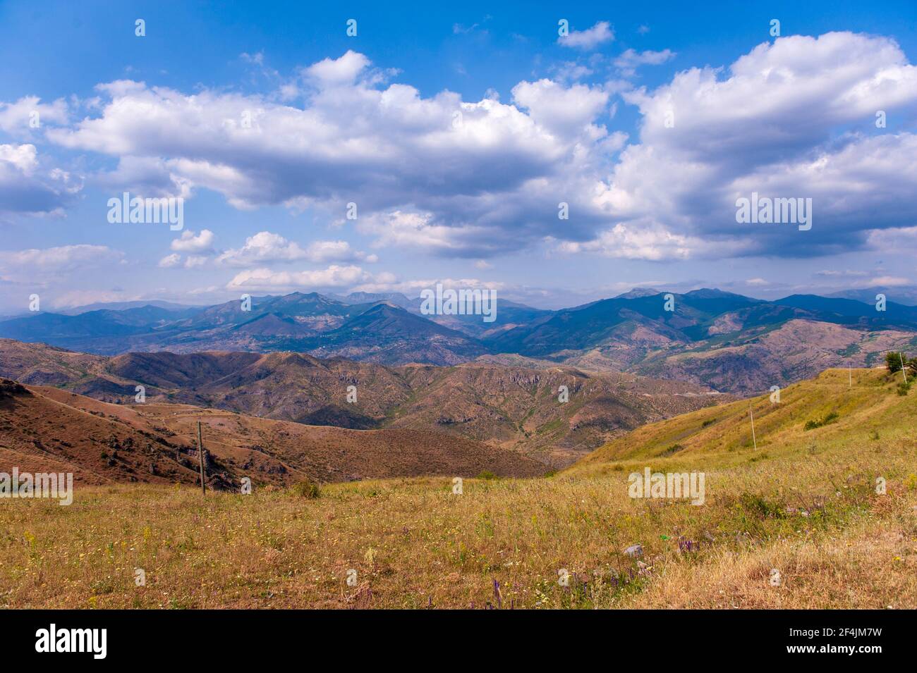 Scenic landscape of mountain ranges in the south of Armenia, Syunik province, with dramatic clouds Stock Photo