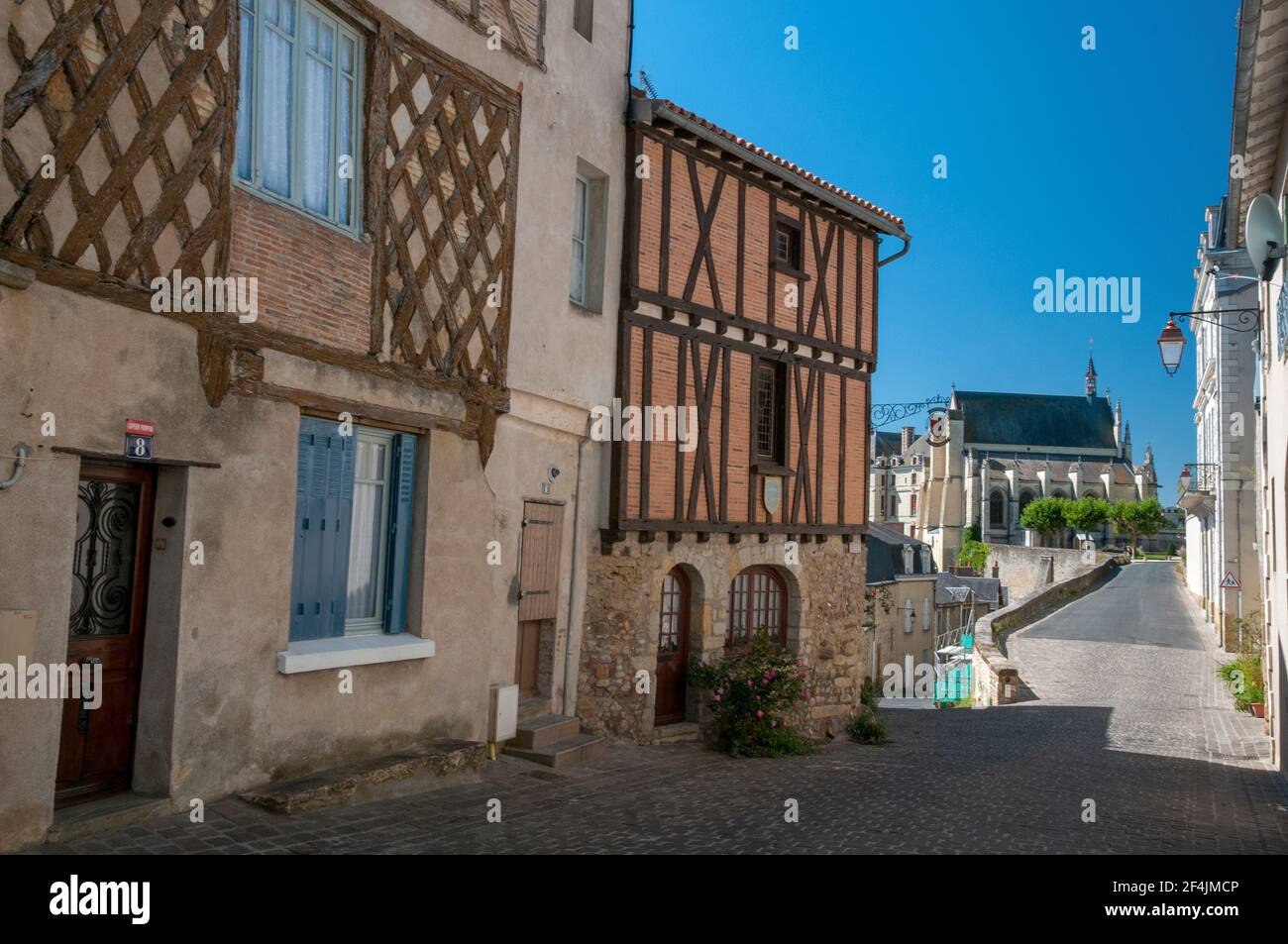 Castle street with timbered houses in Thouars old part of town, Deux-Sevres, Nouvelle-Aquitaine region, France Stock Photo