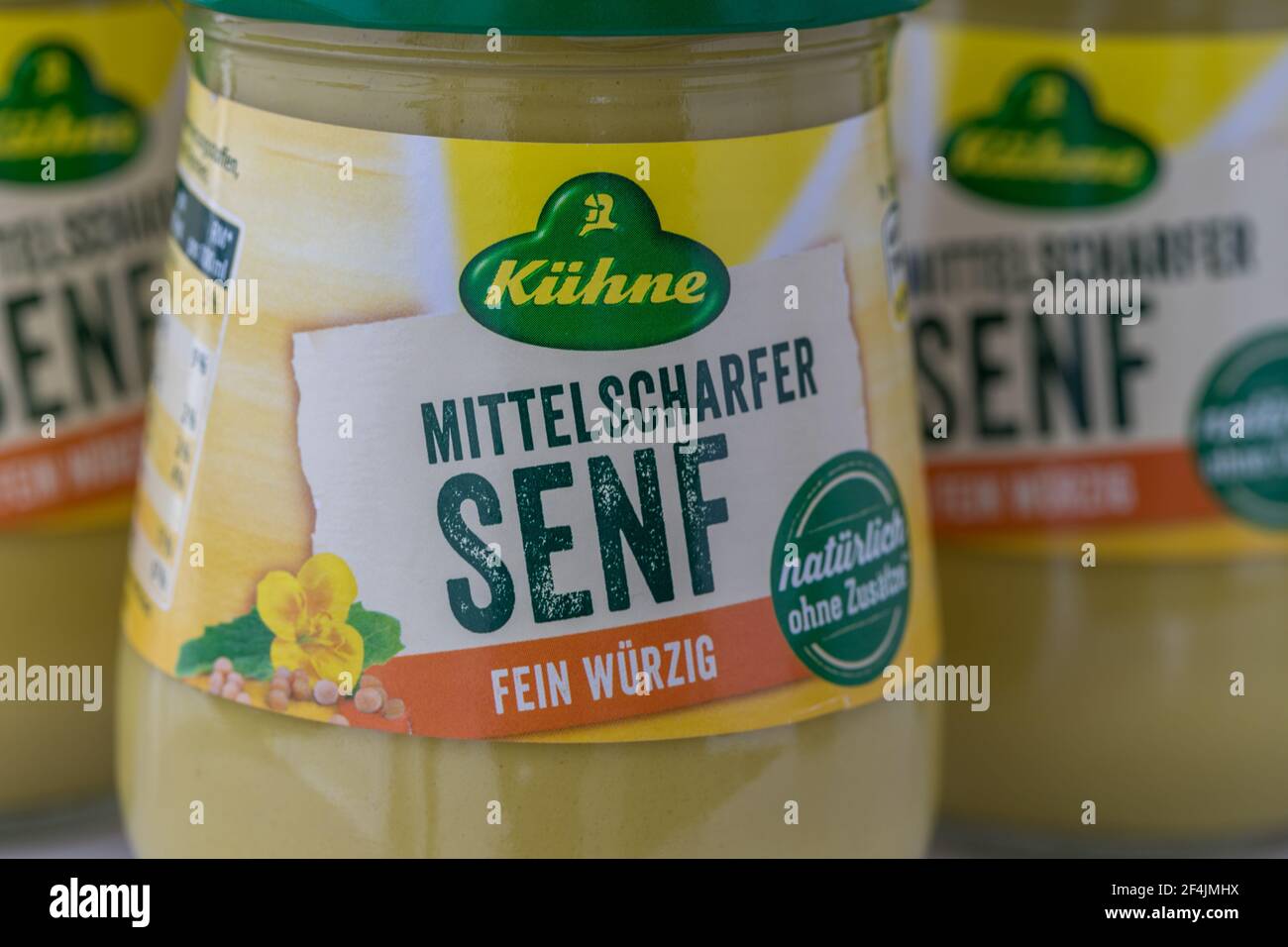 Hildesheim, Germany - March 21, 2021: Close-up of three mustard jar from the company Kühne with fokus on foreground Stock Photo