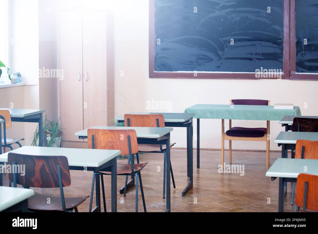 Empty White Classroom Background with Green Chalkboard Table and Seat on  Wooden Floor. Education and Back To School Concept Stock Illustration -  Illustration of education, classroom: 220056564