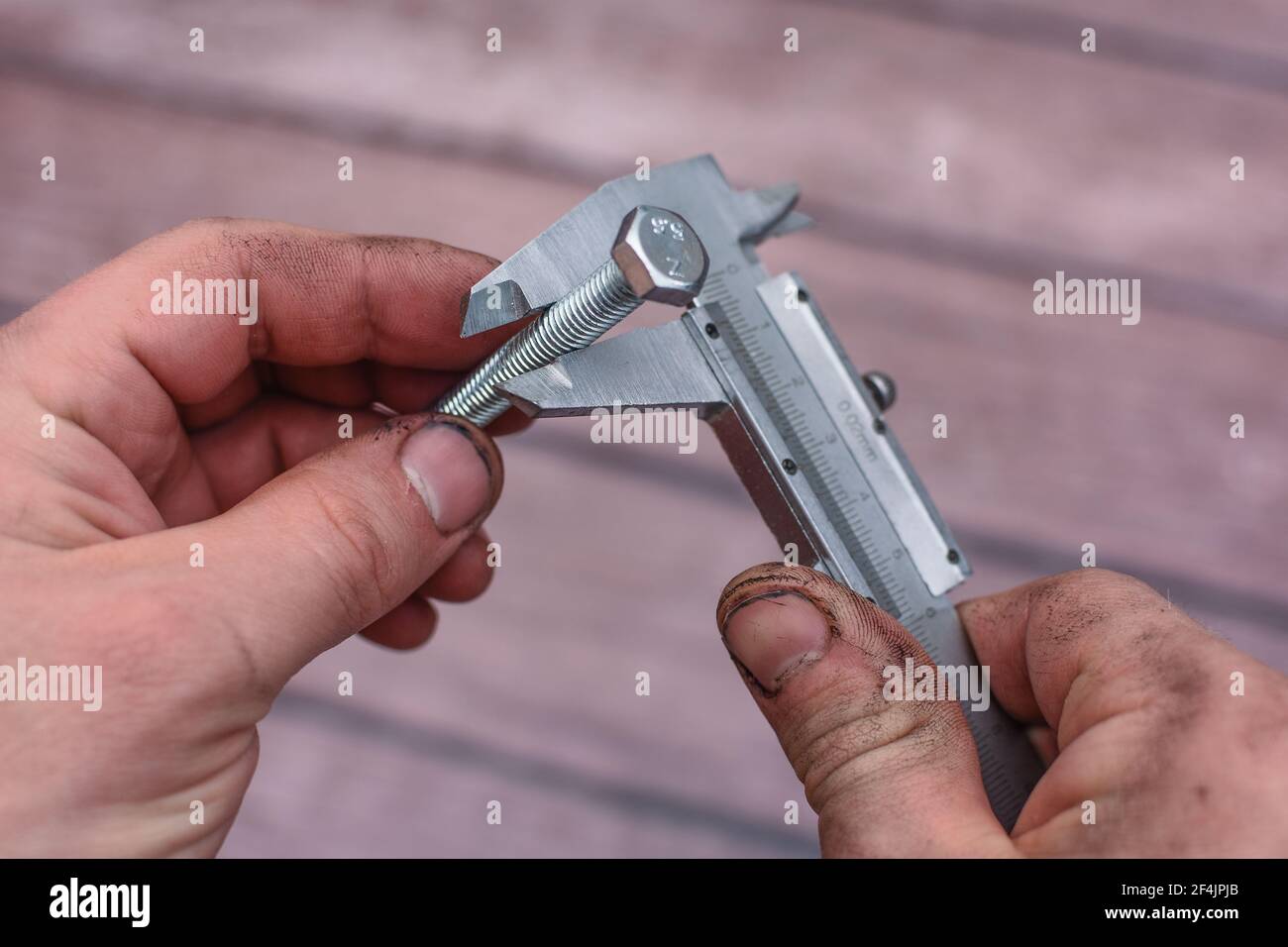 Measuring with vernier caliper bolt diameter for locksmithing work