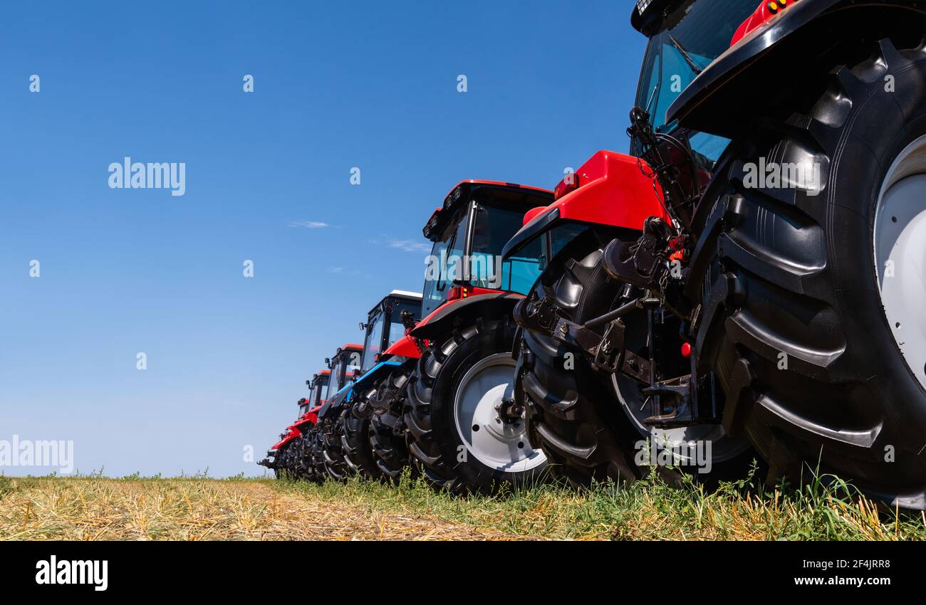 New agricultural tractors in stock Stock Photo - Alamy