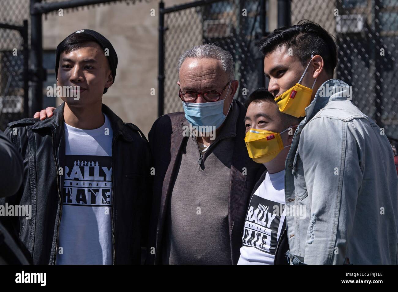 Senate Majority Leader Chuck Schumer (D-NY) poses with Oliver Pras and activists during a rally against hate in Columbus Park in the Chinatown neighbourhood of Manhattan in New York City.A rally for solidarity was organized in response to a rise in hate crimes against the Asian community since the start of the coronavirus (COVID-19) pandemic in 2020. On March 16 in Atlanta, Georgia, a man went on a shooting spree in three spas that left eight people dead, including six Asian women. (Photo by Ron Adar/SOPA Images/Sipa USA) Stock Photo
