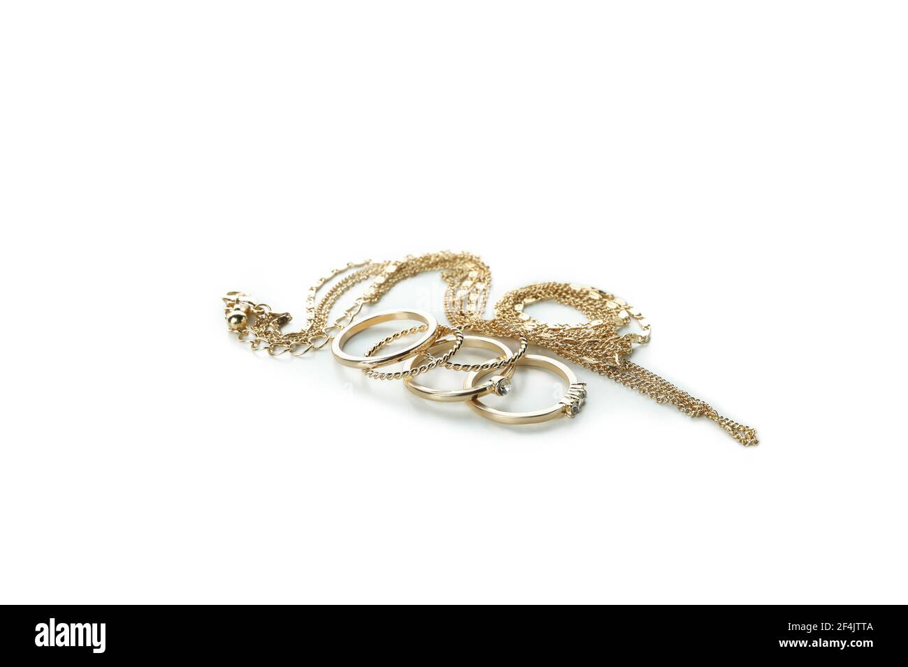 Golden rings and chain isolated on white background Stock Photo - Alamy