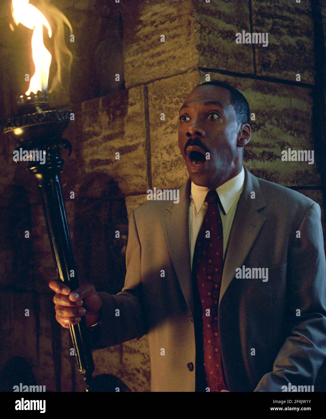 EDDIE MURPHY in THE HAUNTED MANSION (2003), directed by ROB MINKOFF. Credit: DISNEY ENTERPRISES / Album Stock Photo