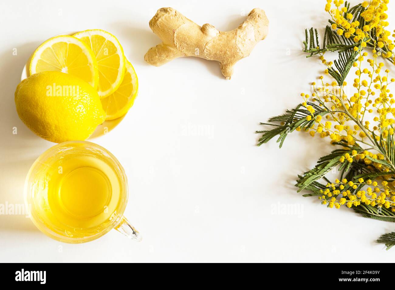 Herbal tea in a cup, ginger, lemon and acacia strengthen immune