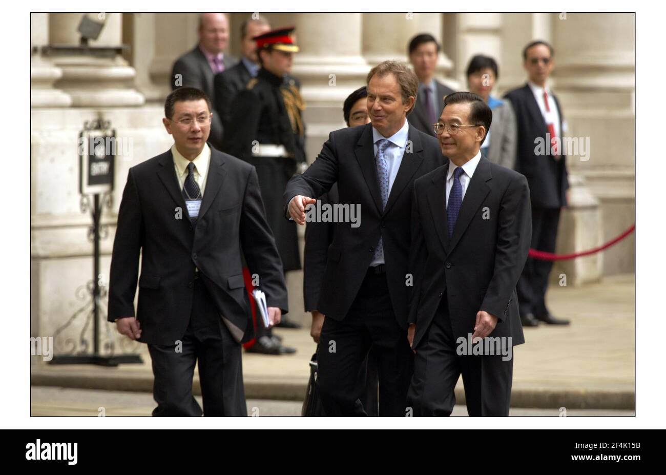 Tony Blair meets the Premier of the State Council of the Peoples Republic of China, H.E. Mr Wen Jiabao in the courtyard of the Foriegn Office to inspect the guard of Honour, The Queens co First Batalion Grenadier Guards.pic David Sandison 10/5/2004 Stock Photo