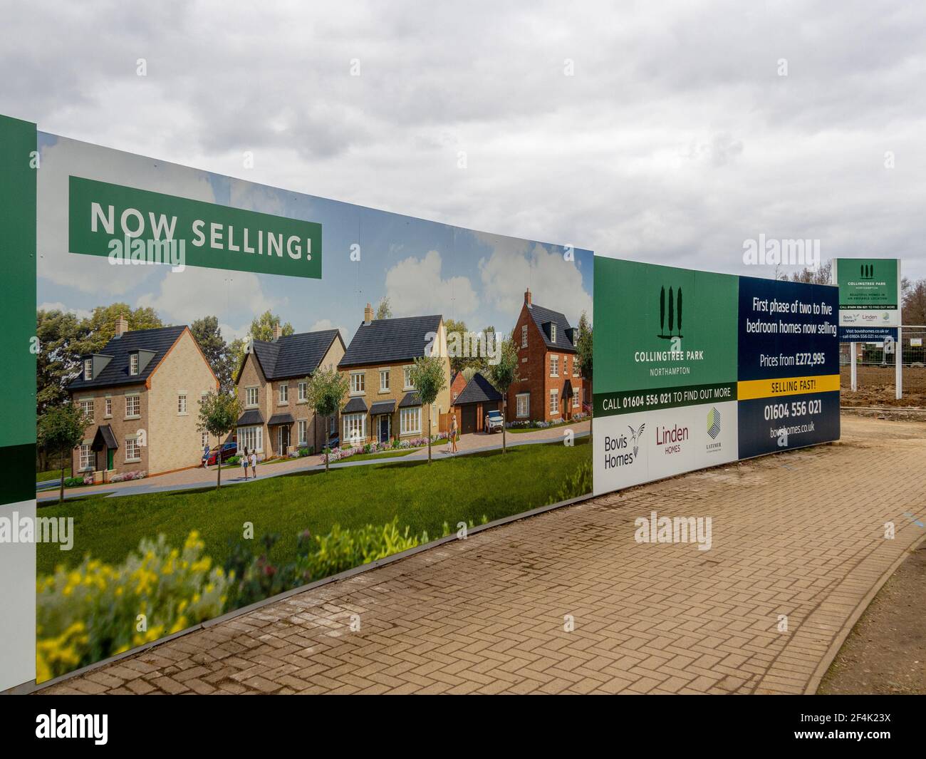Hoardings advertising new houses at Collingtree Park, Northampton, UK; the development is being built on part of the Golf Course. Stock Photo