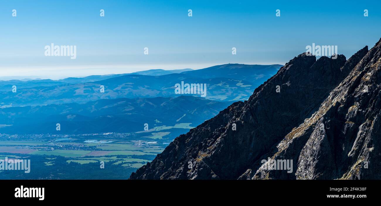 View to Kralova hola in Nizke Tatry, Stolica and many other hils in Slovenske rudohorie mountains and Bukk mountain in Hungary on the background from Stock Photo