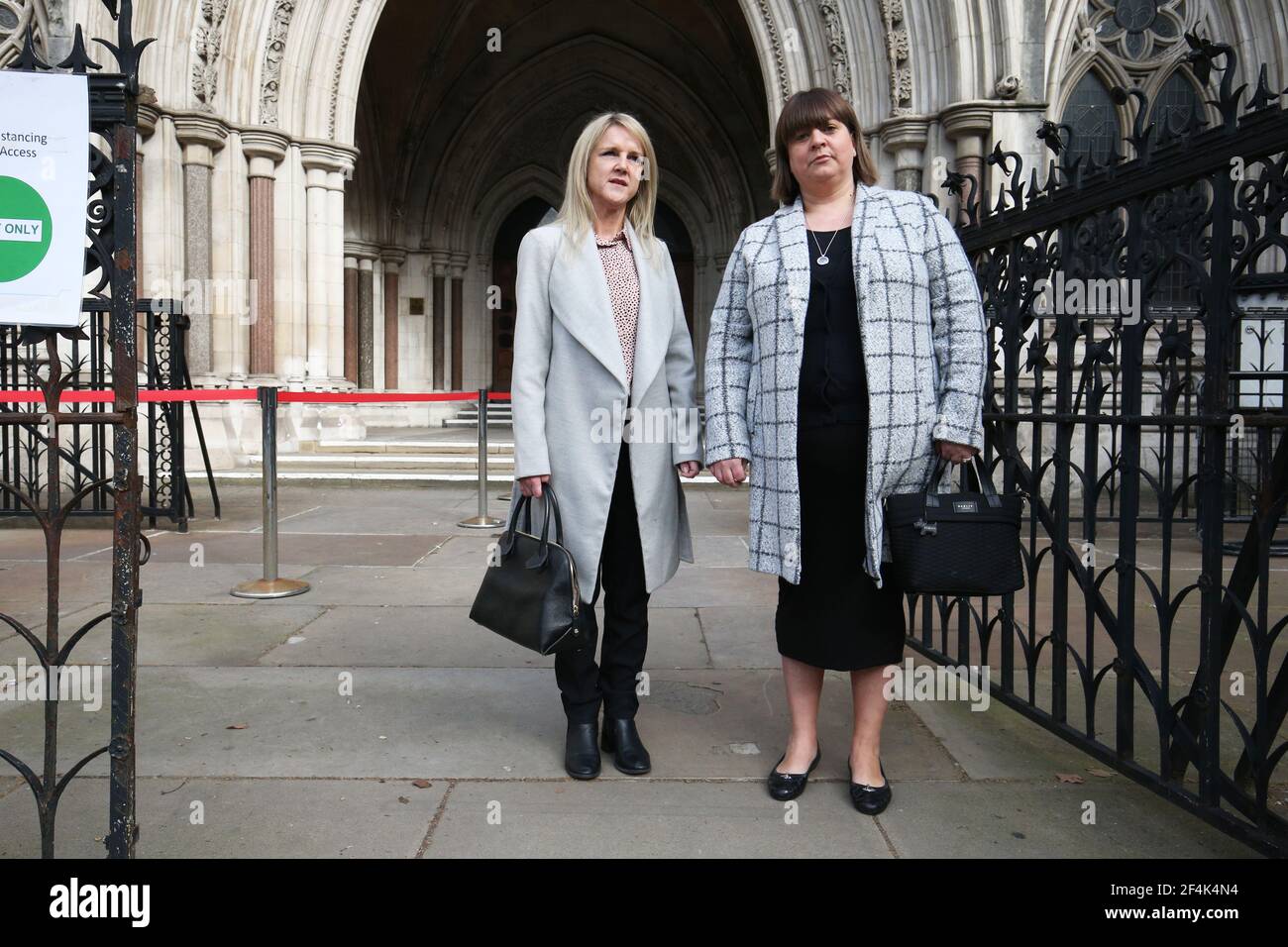 Former subpostmasters Janet Skinner (left) and Tracy Felstead outside the Royal Courts of Justice, London, ahead of their appeal against a conviction of theft, fraud and false accounting. Dozens of former subpostmasters who were convicted of theft, fraud and false accounting are attempting to clear their names, arguing their convictions are unsafe because of failings in the Post Office's Fujitsu-developed Horizon IT system. Picture date: Monday March 22, 2021. Stock Photo