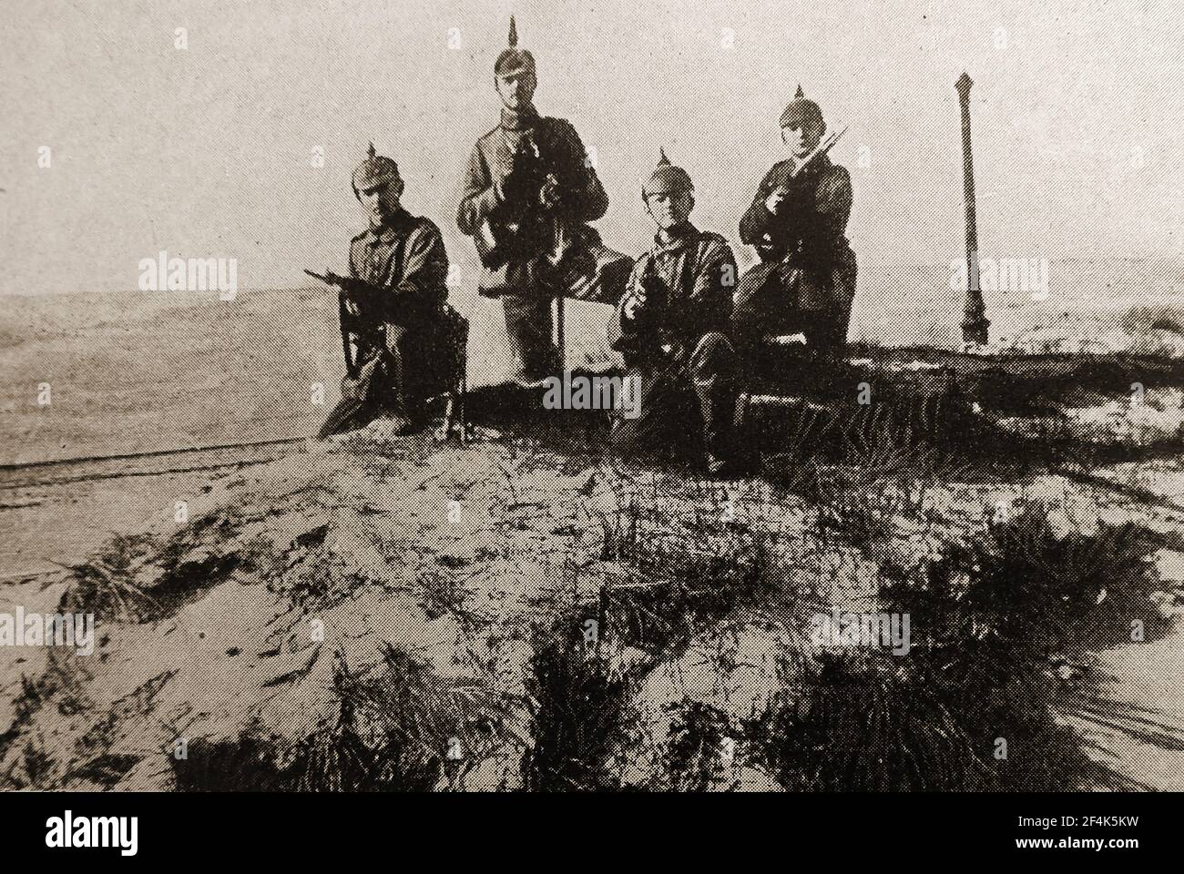 A WWI press photograph of  German soldiers on patrol on a Belgian beach Stock Photo