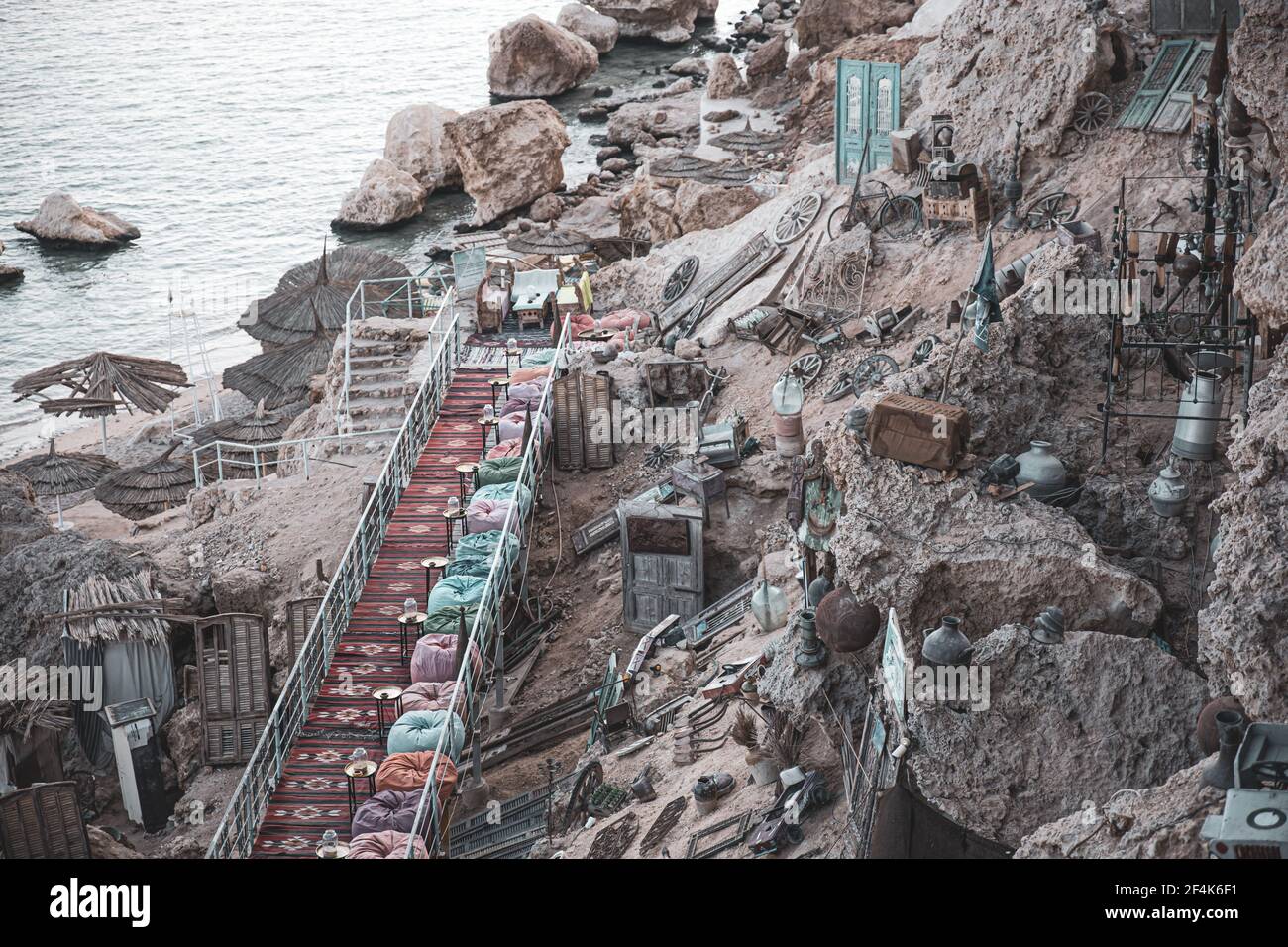 A colorful and authentic place with many antiques and an oriental atmosphere near a cliff by the sea. Stock Photo
