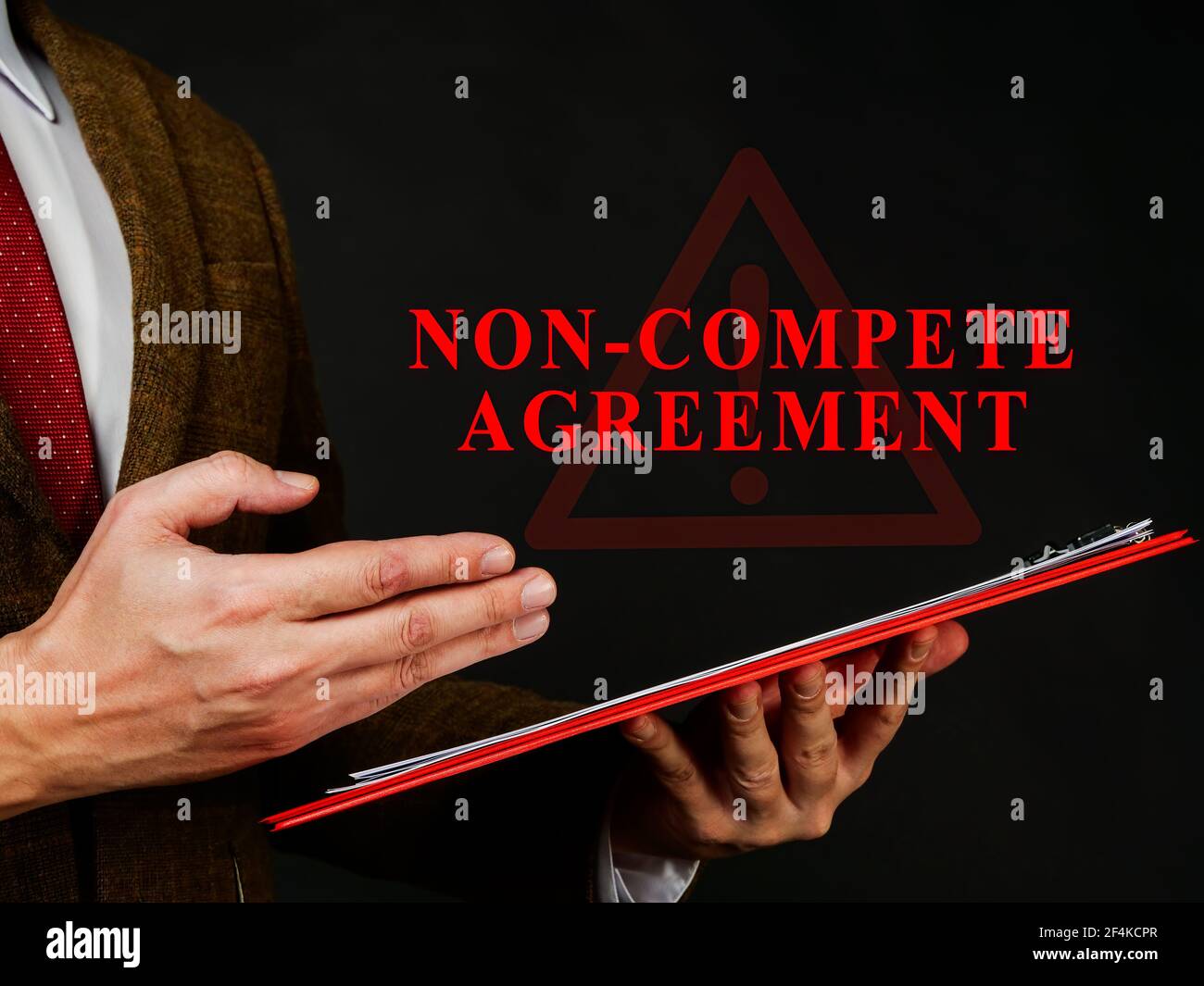 Non compete agreement or clause in the red folder. Stock Photo