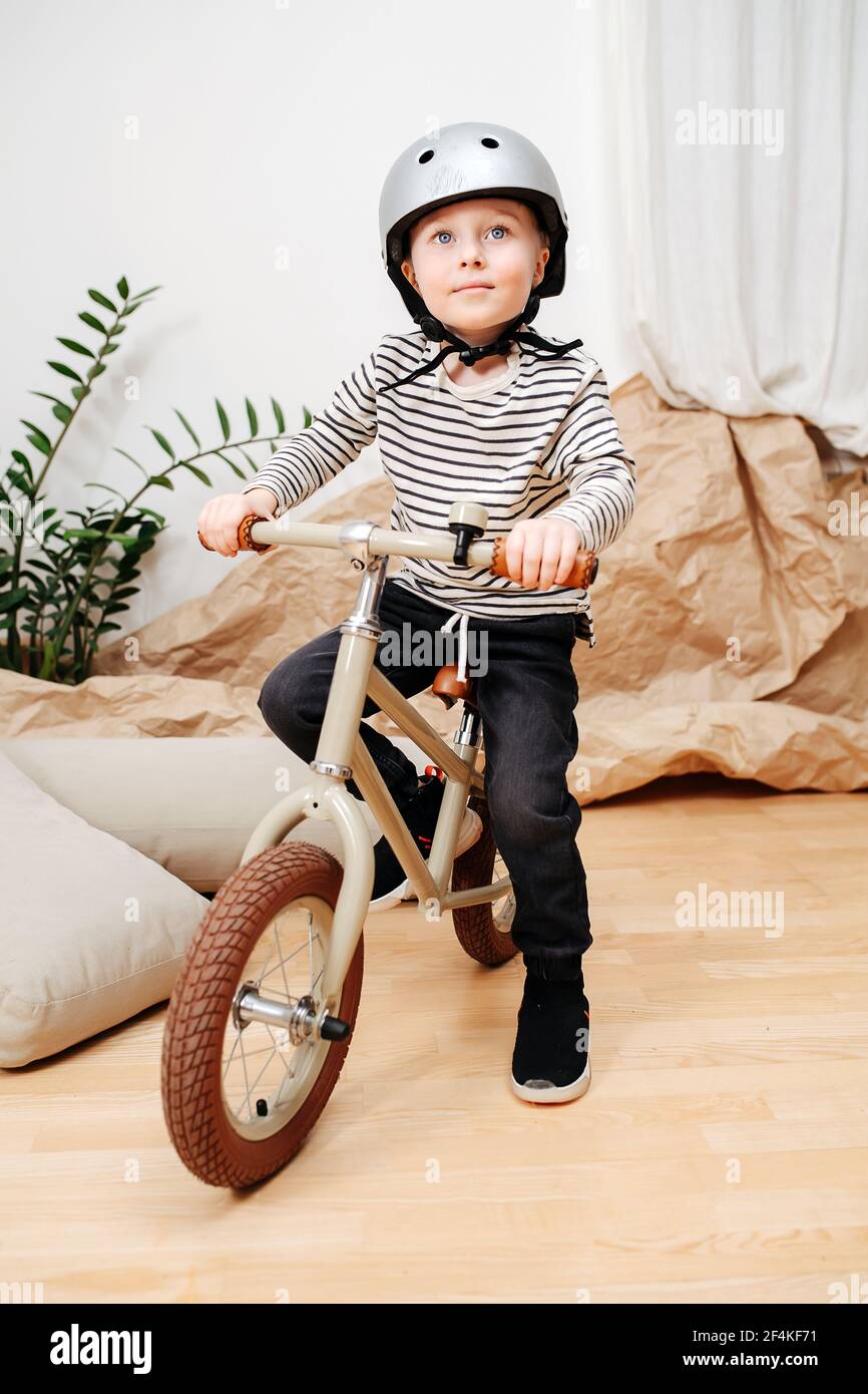 Happy kid boy helmet wearing hi res stock photography and images