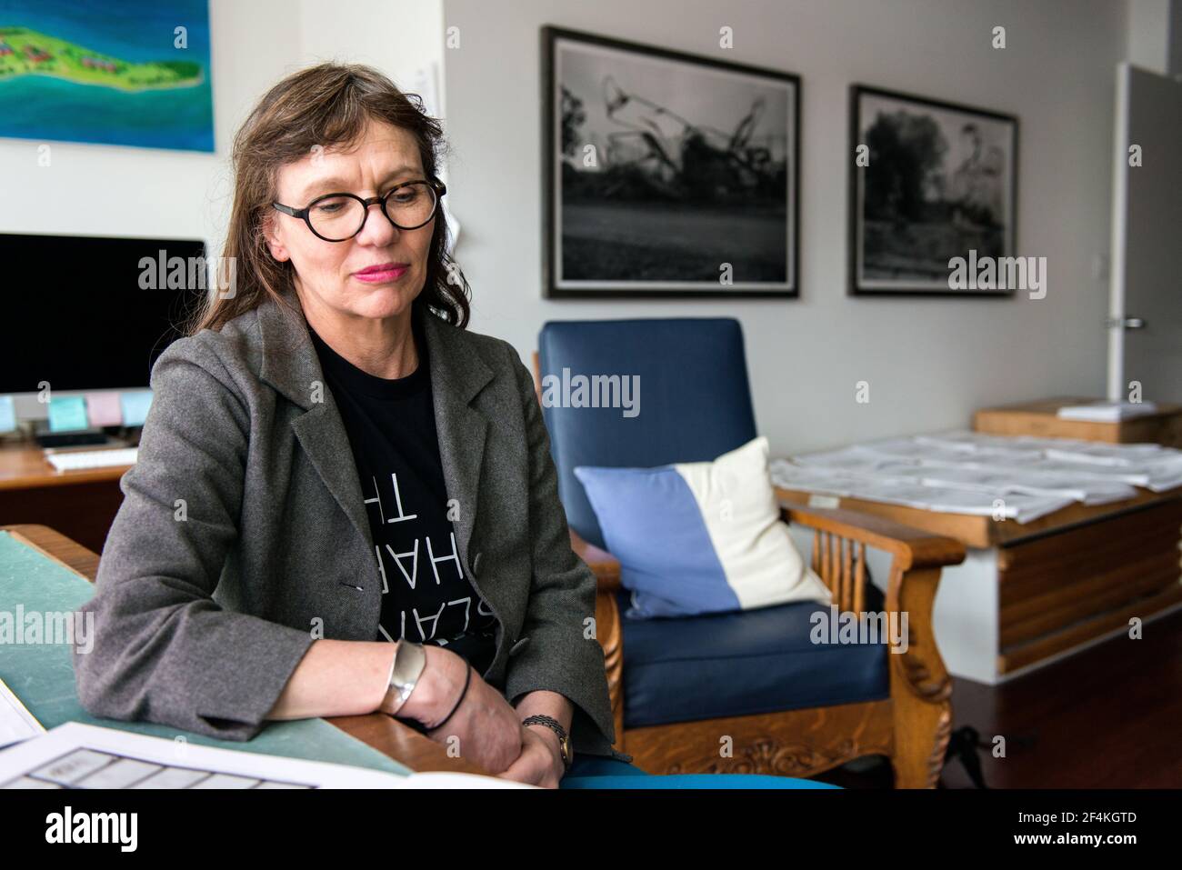 Peekskill, New York, USA. Female artist, Melinda Hunt, giving an interview about her work on The Hart Island Project from her studio. Stock Photo