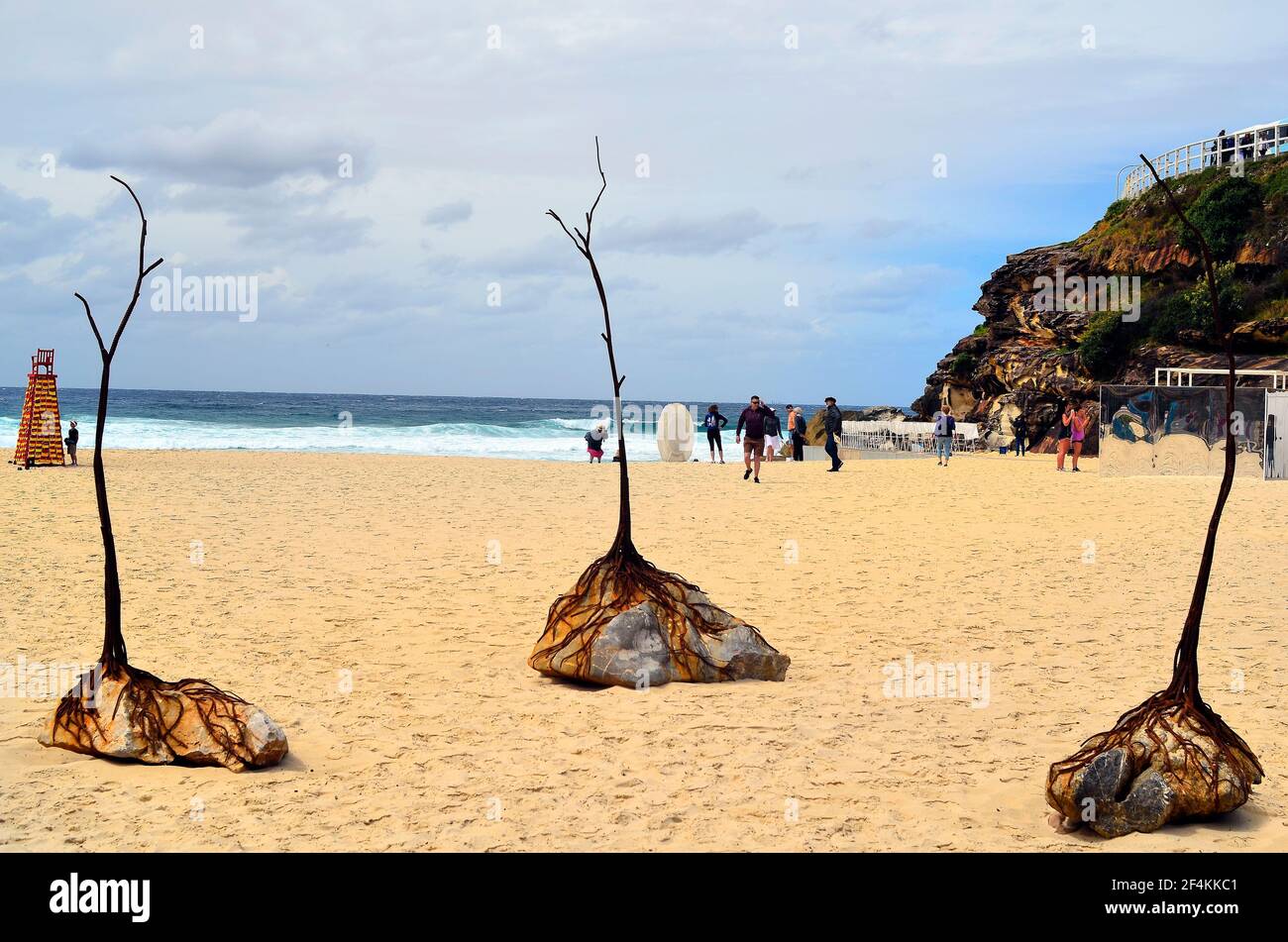 Sydney, NSW, Australia - October 31,2017: Unidentified people on beach of Tamarama by outdoor exhibition Sculpture by the Sea with different artworks Stock Photo