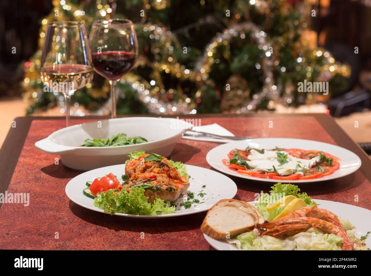 Restaurant food with fresh ingredients - christmas tree and food in restaurant Stock Photo