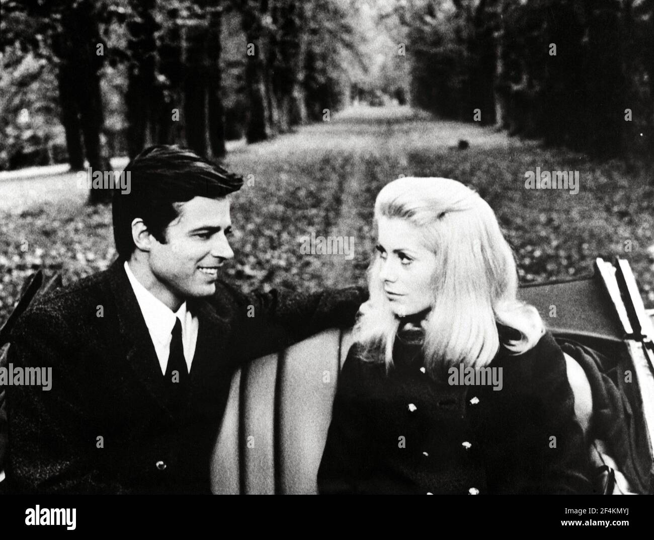 CATHERINE DENEUVE and JEAN SOREL in BELLE DE JOUR (1967), directed by LUIS BUÑUEL. Credit: PARIS FILM/FIVE FILM / Album Stock Photo