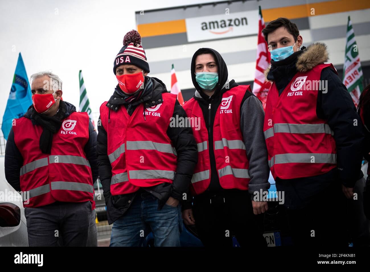 Brandizzo, Italy. 22nd Mar, 2021. BRANDIZZO, ITALY - March 22, 2021:  Amazon's employees of 'Filt CGIL' trade union are seen during a  demonstration for better working conditions in front of the Amazon