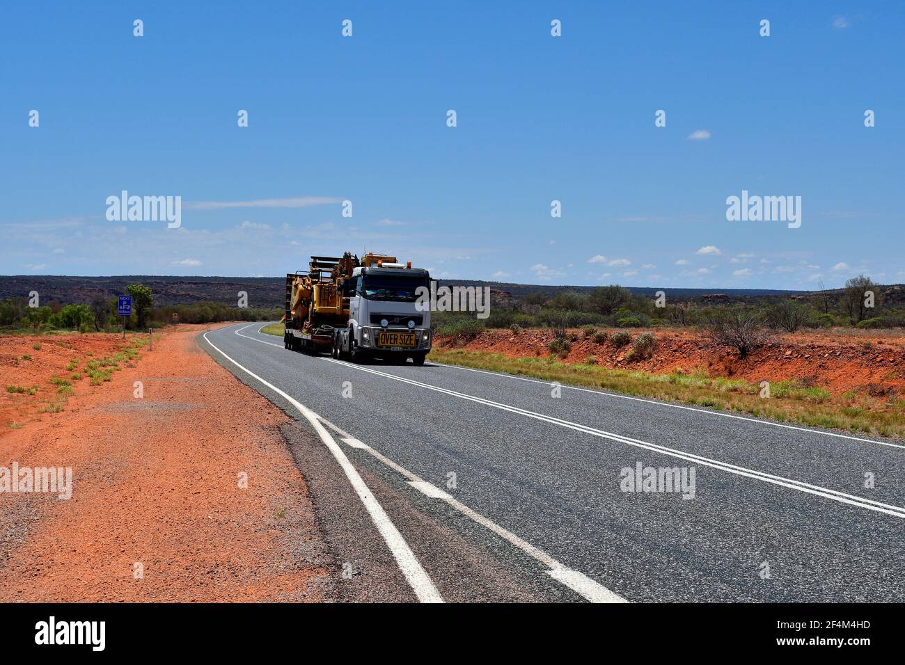 Australia, Northern Territory - November 15, 2017: Heavy oversize transport with truck named Road Train on Stuart Highway Stock Photo
