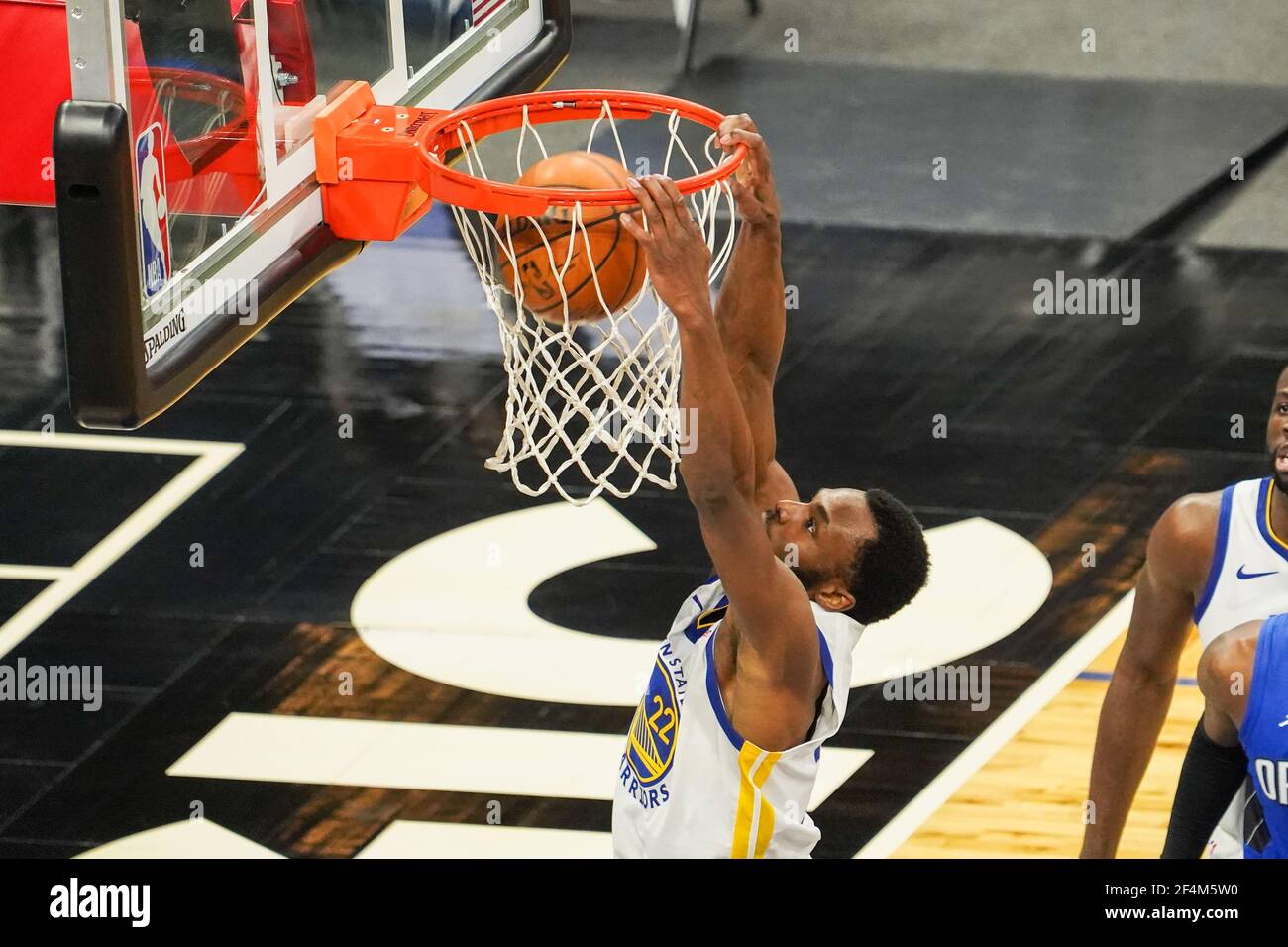 Orlando, Florida, USA, February 19, 2021, Golden State Warriors player Andrew Wiggins #22 makes a dunk against the Orlando Magic at the Amway Center  (Photo Credit:  Marty Jean-Louis) Stock Photo