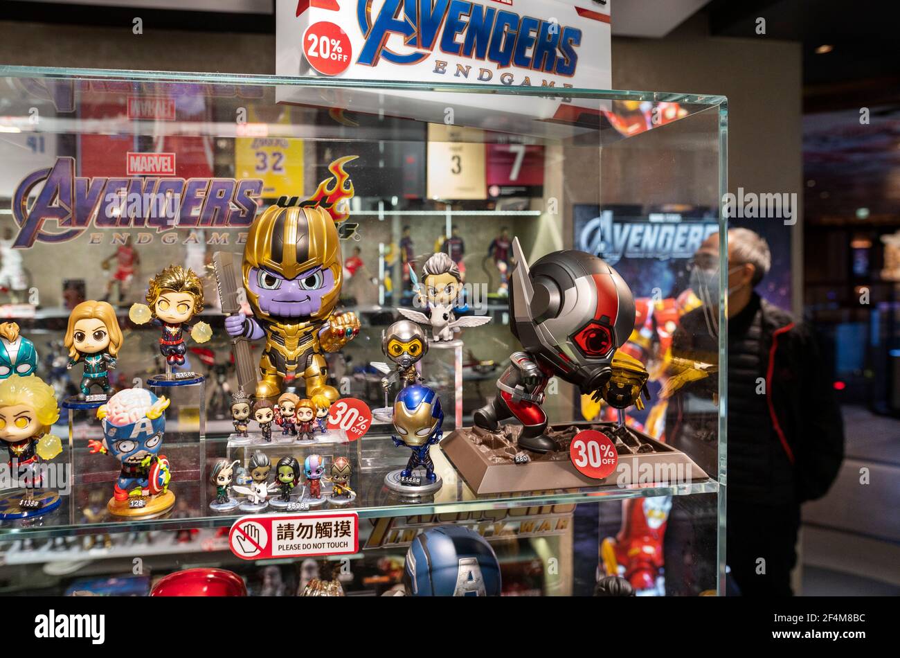 Hong China 21st Mar 21 A Shopper Looks At Disney Own Label Marvel Avengers Comic And Movie Character Figure Products And Merchandise Seen At Store In Hong Kong Credit Sopa Images Limited Alamy