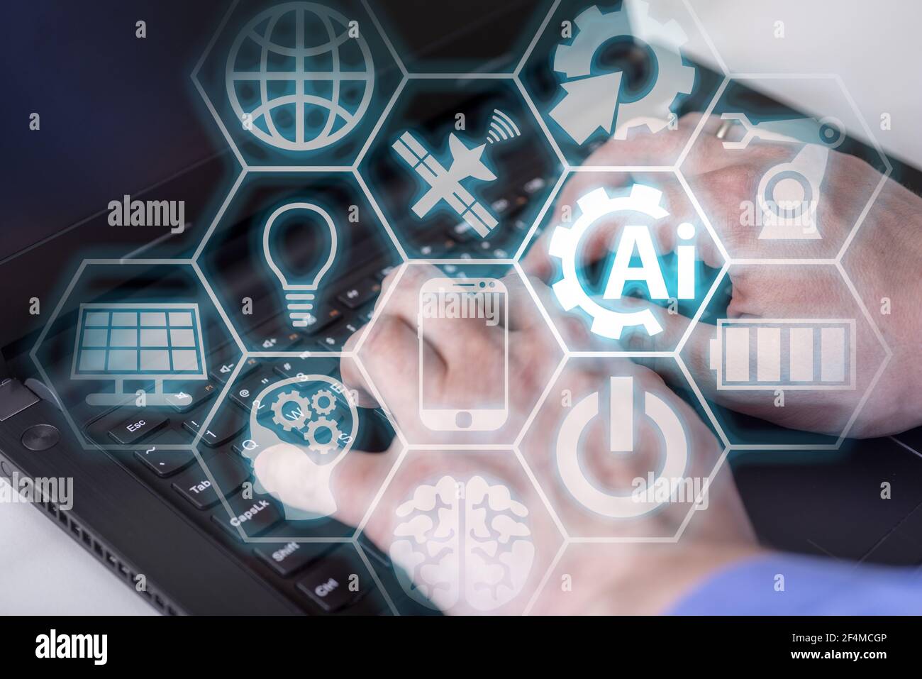 Double exposure of creative artificial Intelligence icon with hands typing on laptop on background. Neural networks and machine learning concept Stock Photo