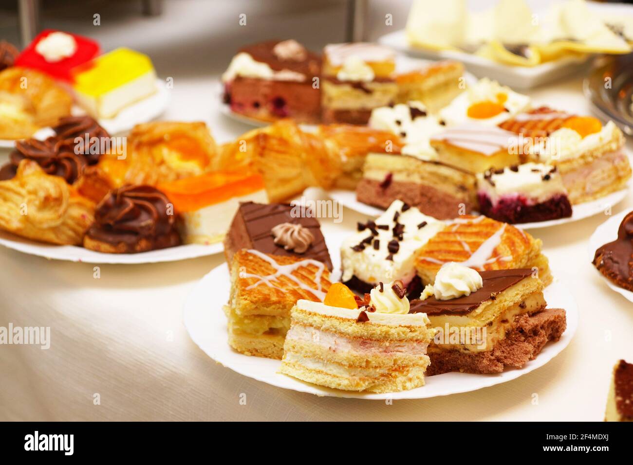 Cake variation on plates Stock Photo - Alamy