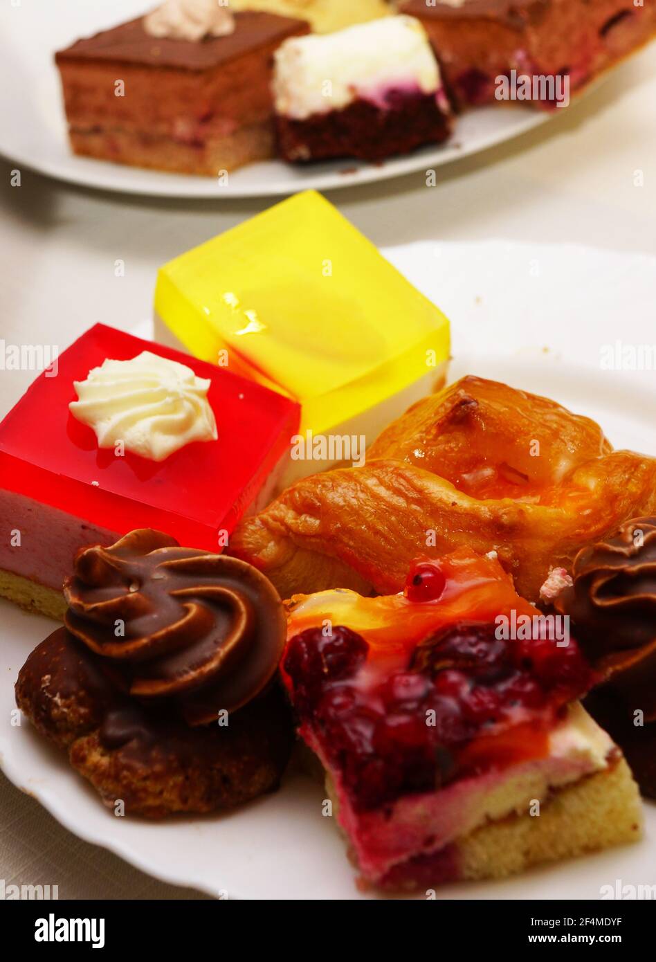 Cake variation on plates Stock Photo - Alamy