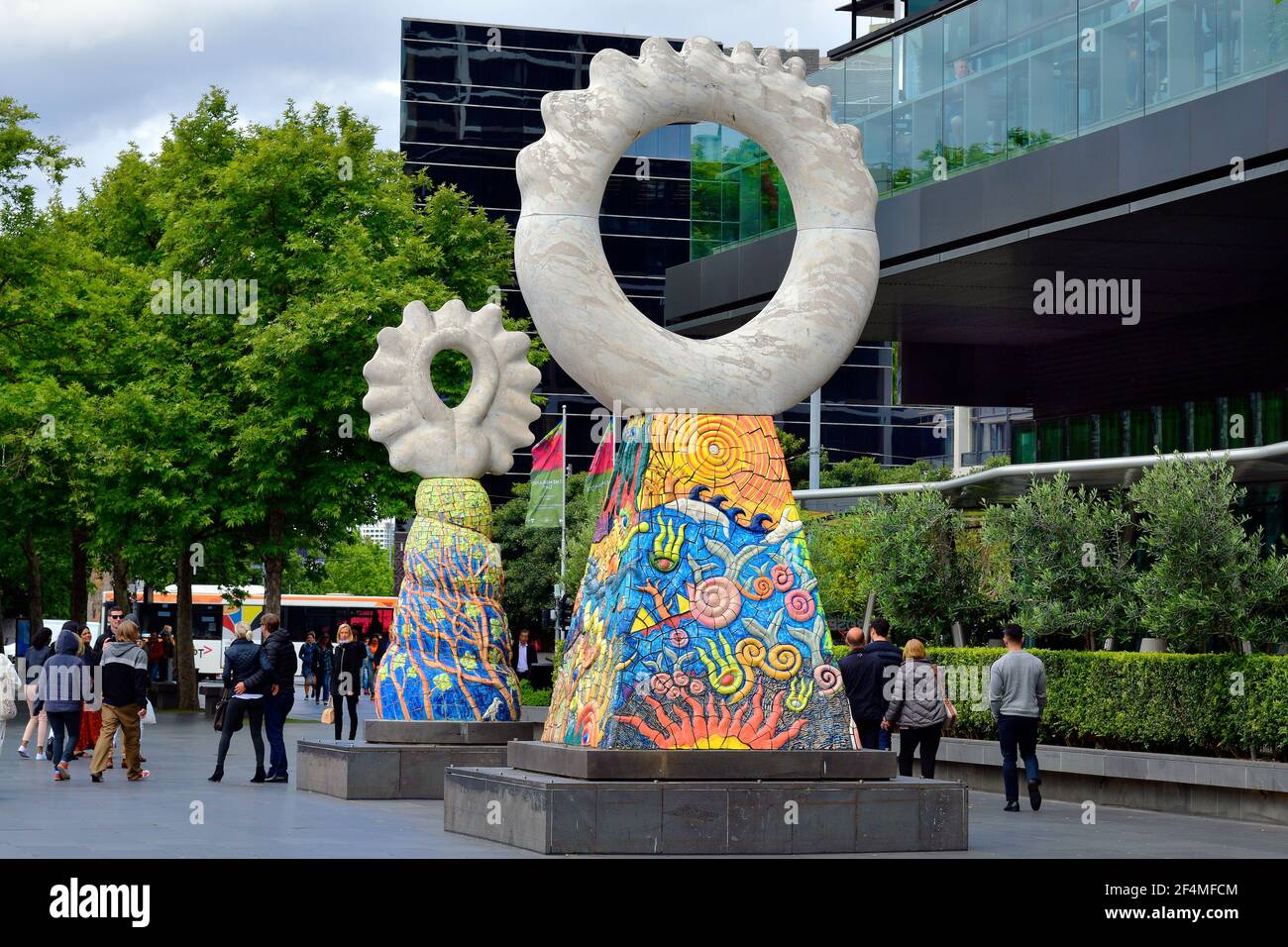 Melbourne, VIC, Australia - November 03, 2017: Unidentified people and two sculptures named The Guardians by Simon Rigg on Southbank promenade Stock Photo