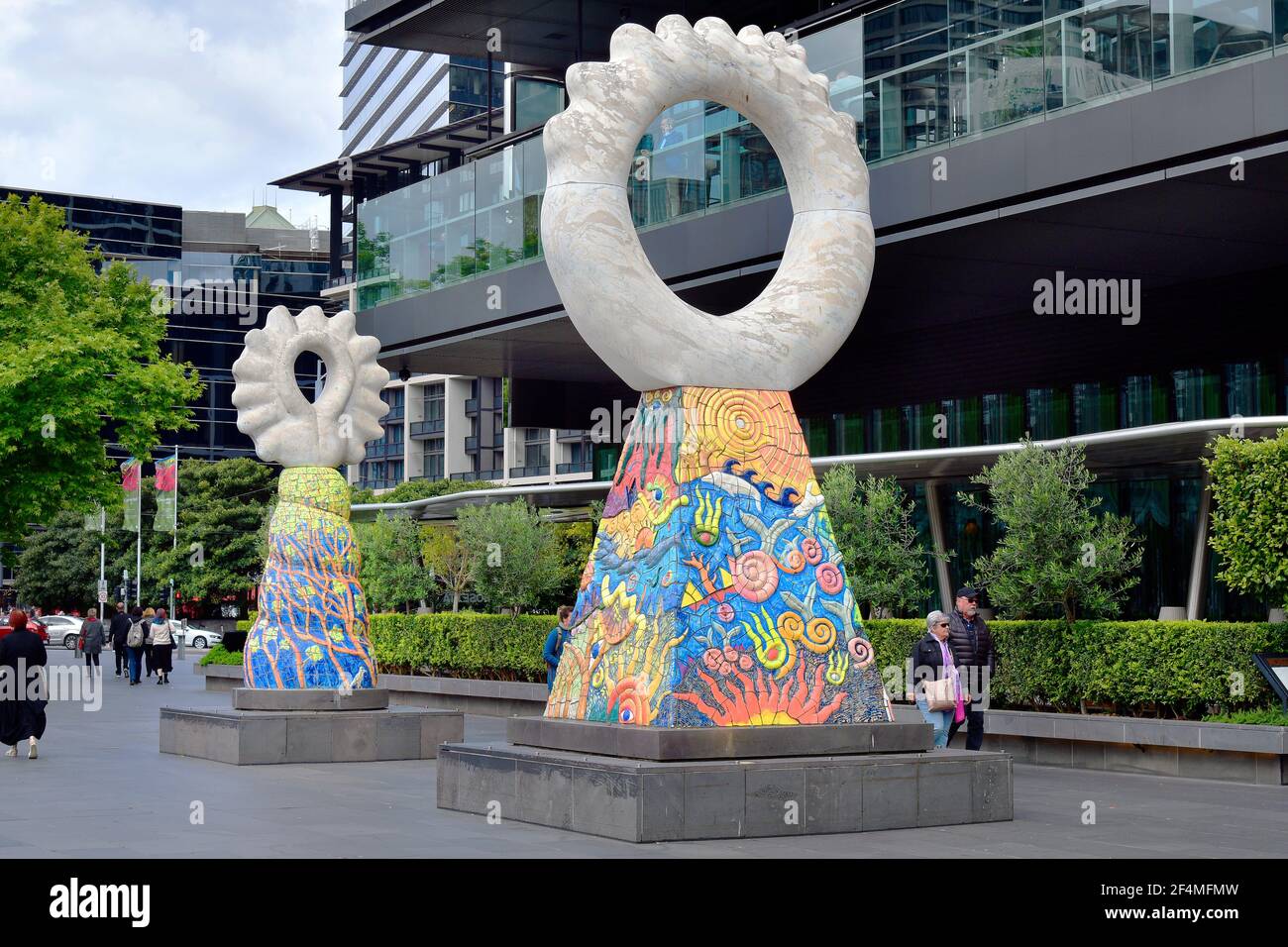 Melbourne, VIC, Australia - November 03, 2017: Unidentified people and two sculptures named The Guardians by Simon Rigg on Southbank promenade Stock Photo