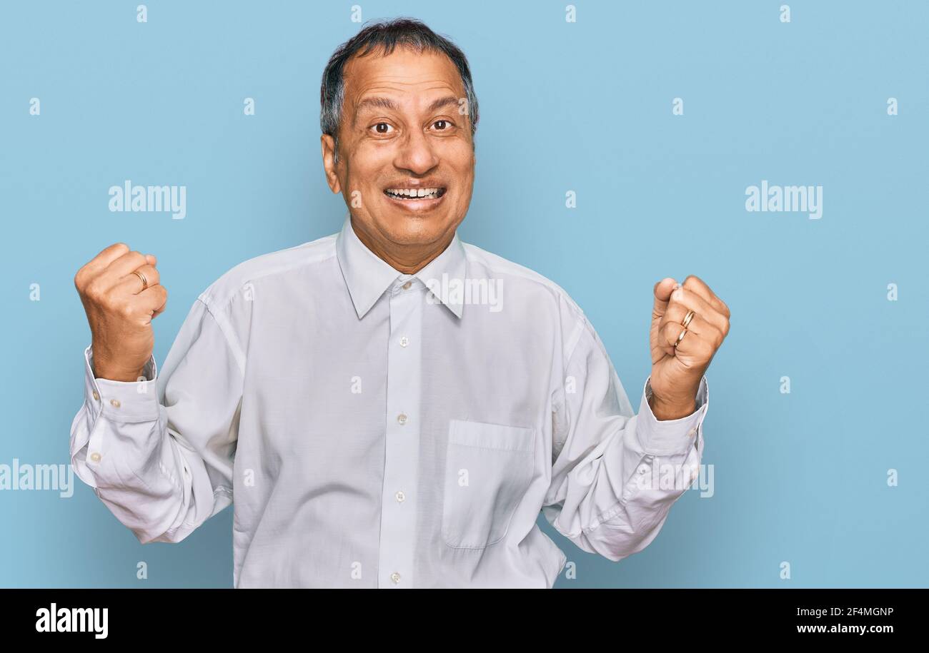 South indian man standing arms hi-res stock photography and images - Alamy