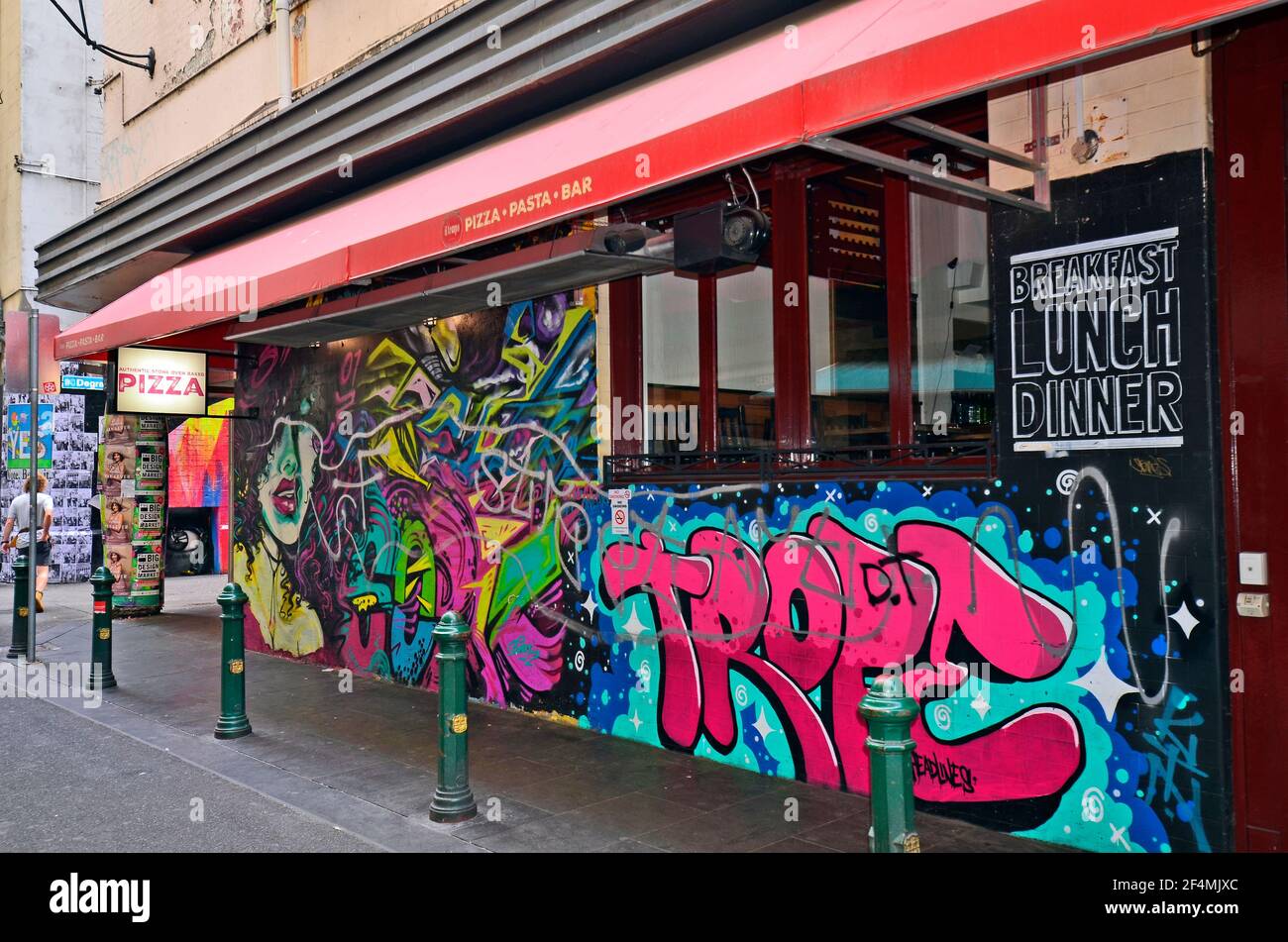 Melbourne, VIC, Australia - November 05, 2017: Restaurant in Hosier Lane - public urban street art gallery covered with ever-changing graffiti in the Stock Photo