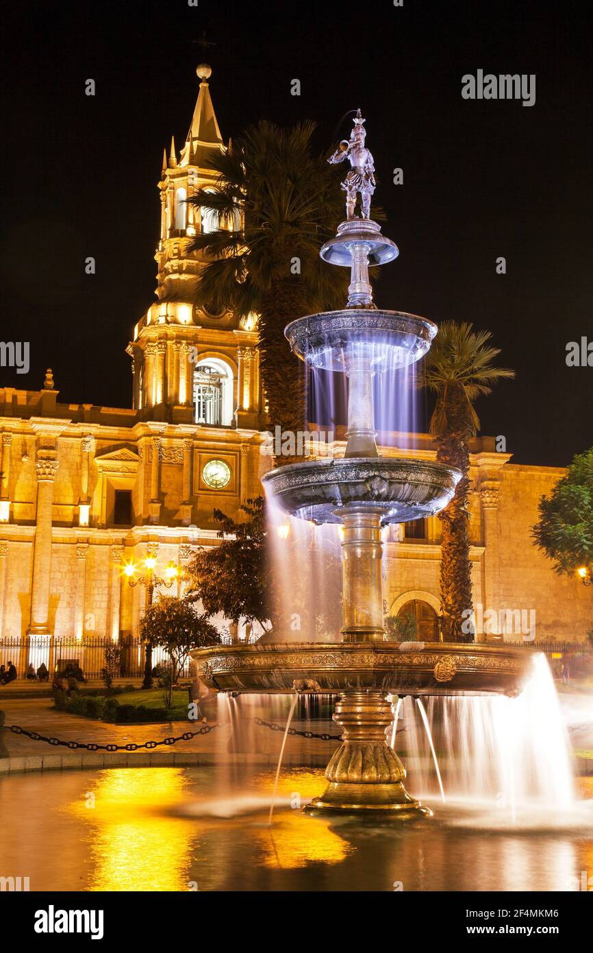 Basilica cathedral de Arequipa and fountain on Plaza de Armas main square of Arequipa city, night view, Peru Stock Photo