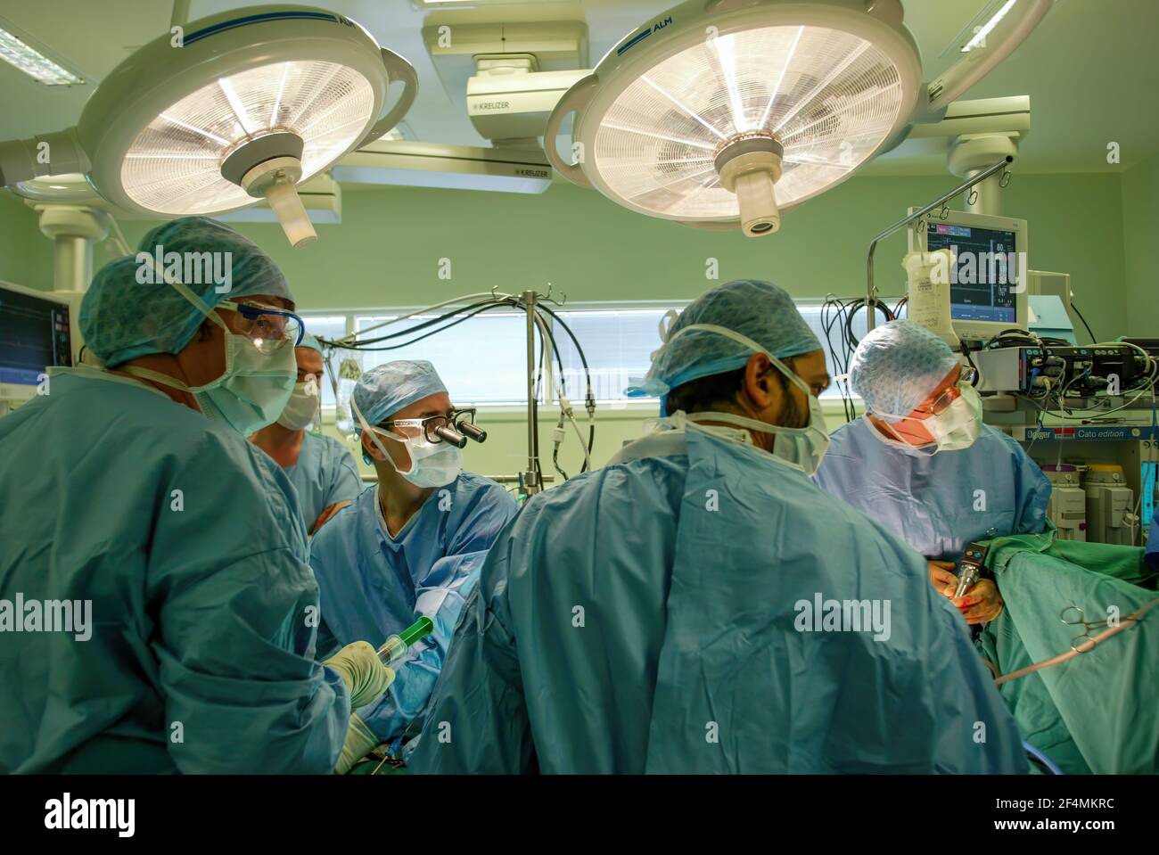 Consultant cardiologist Ciro Campanella (wearing optics), and his team, performing heart surgery at Edinburgh Royal Infirmary, Edinburgh, Scotland Stock Photo